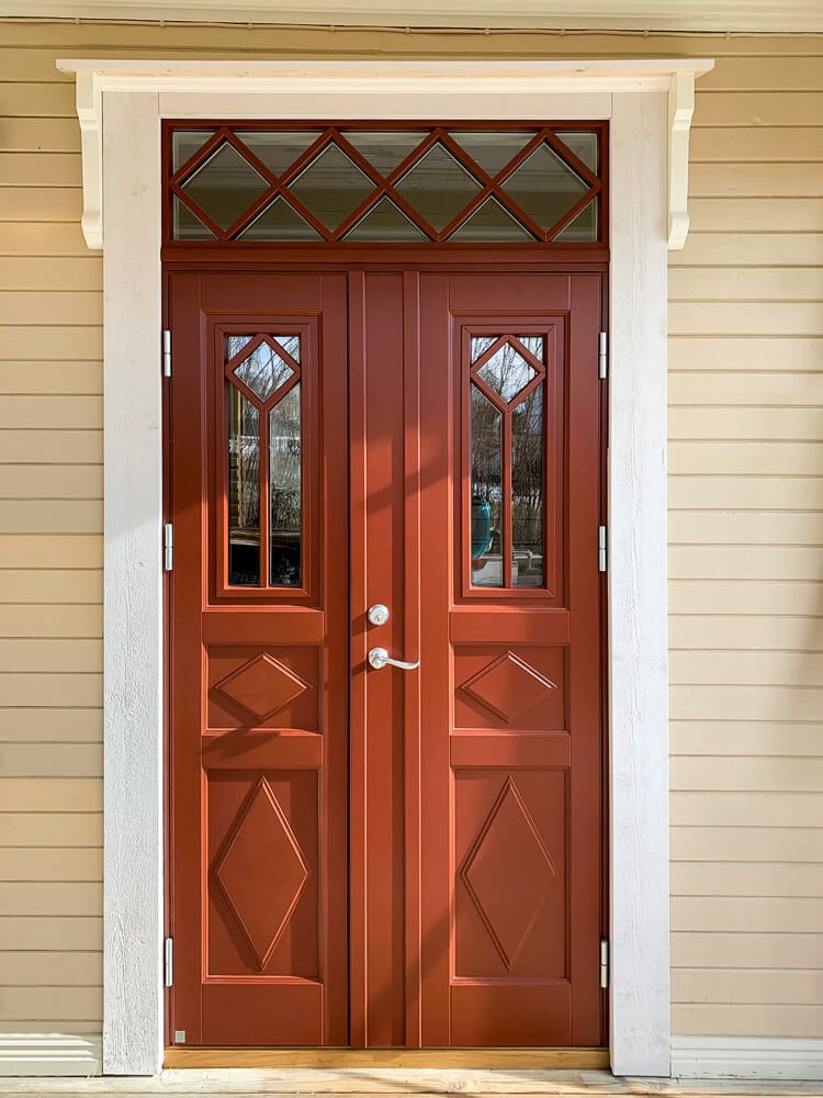 Double door custom with double lists and astragals in Swedish red 1596